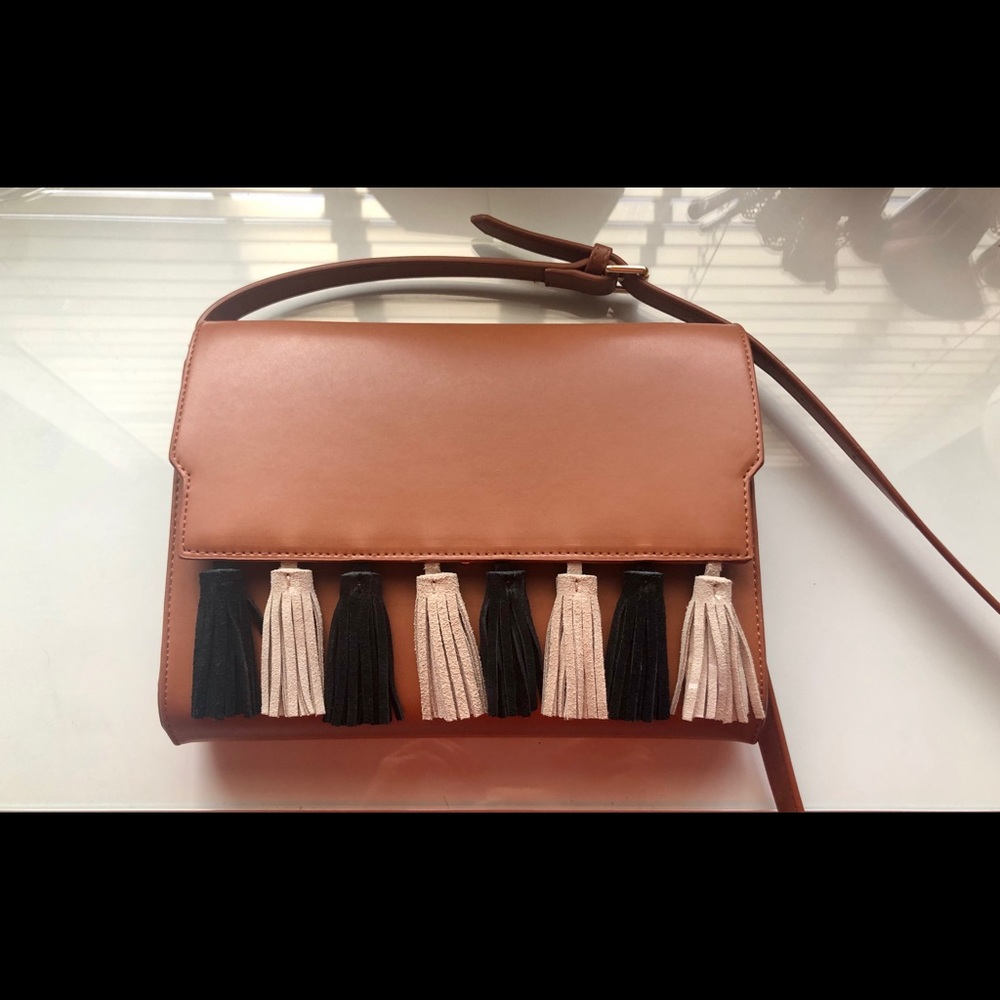 Brown leather cross body w/ Black and Tan tassels